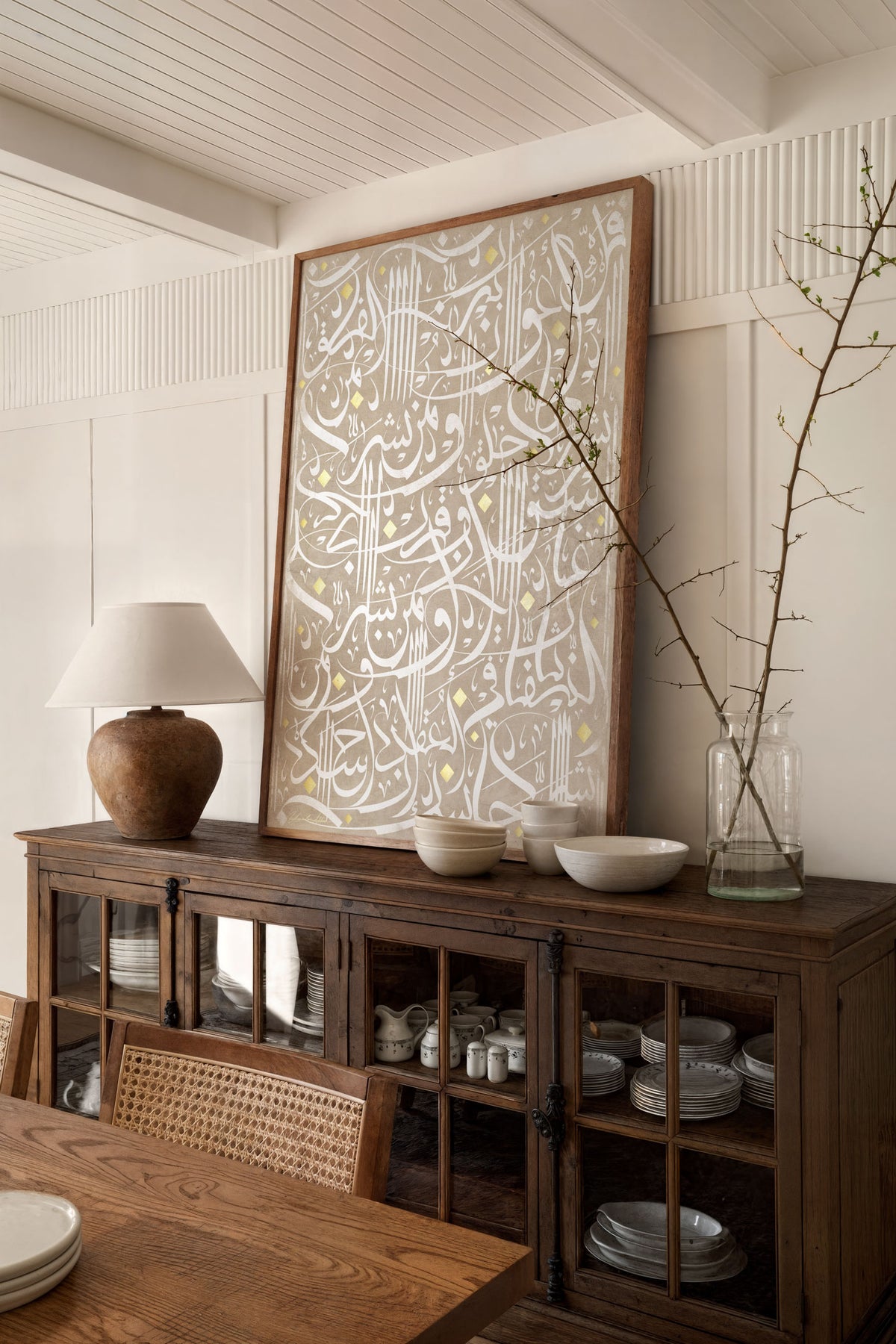 Surat Al Falaq white modern Arabic Calligraphy framed wall art in a modern rustic natural wooden dining room