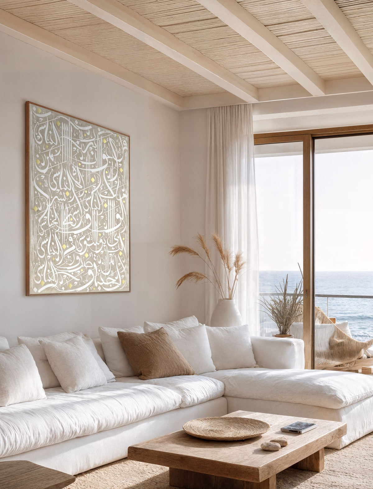 Surat Al Nas white modern Arabic Calligraphy framed wall art in a minimal modern white living room with ocean view