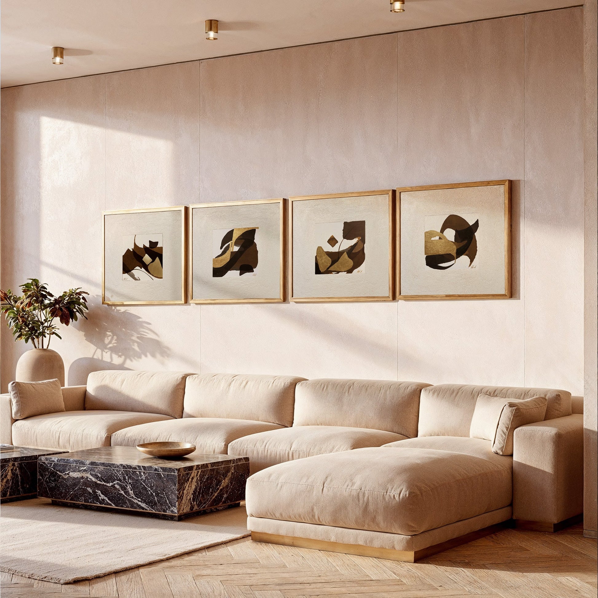 Abstract Arabic letter formations in brown with gold leafing framed wall art in a cosy modern living room with natural sunlight 