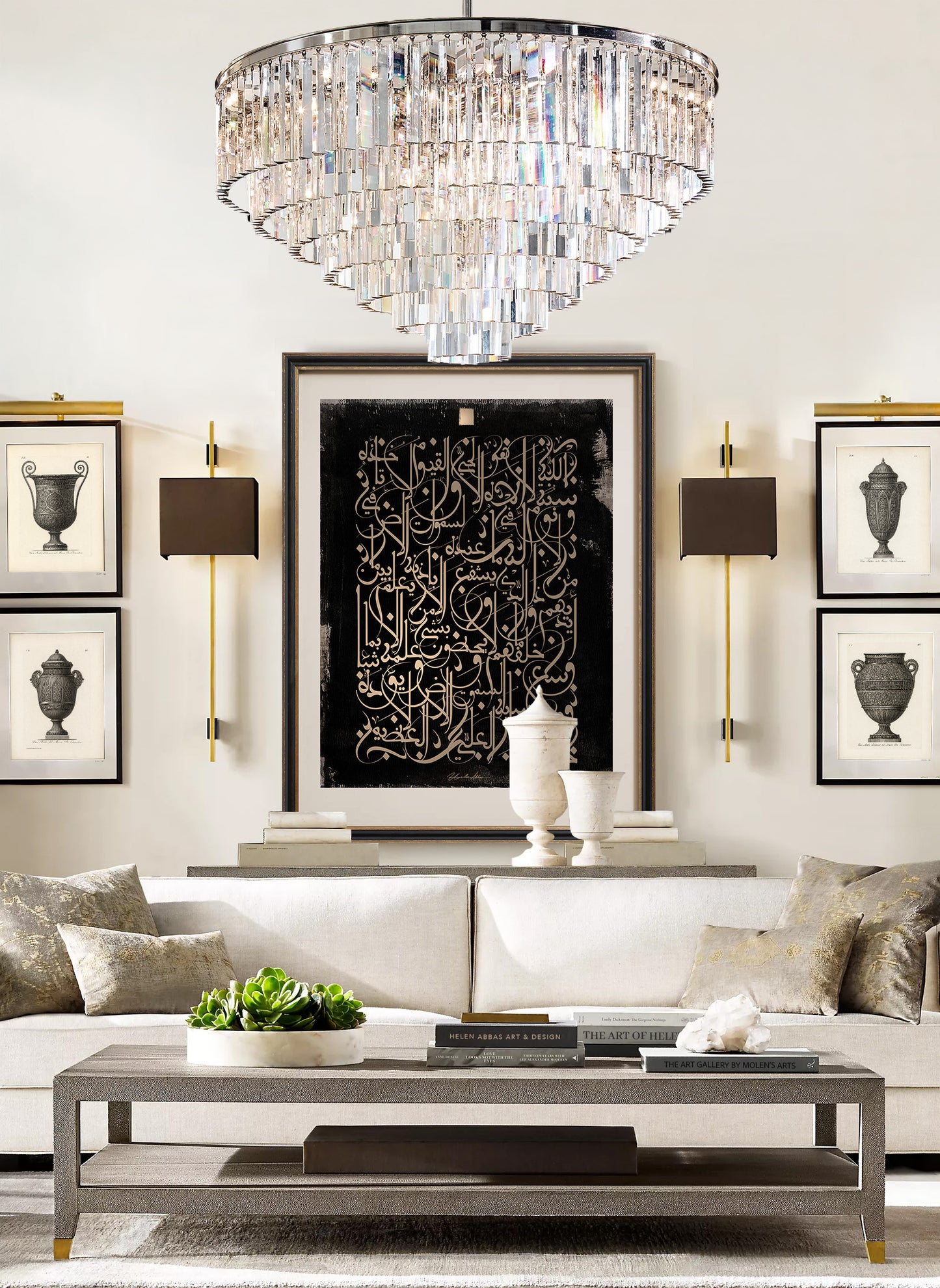 Living room with a chandelier, framed gold Arabic calligraphy artwork by Helen Abbas of Ayatul Kursi, and a white sofa.