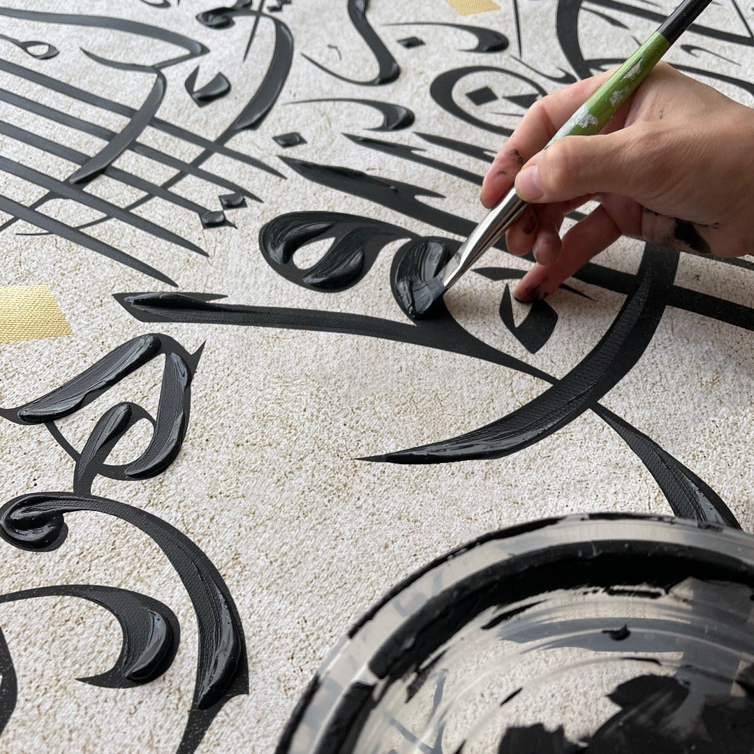 Artist hand painting Arabic black acrylic Calligraphy on cotton canvas